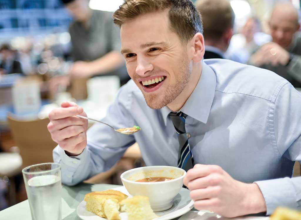 Man eating soup