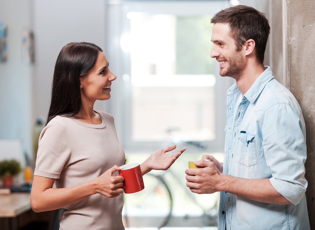 co workers talking at the office