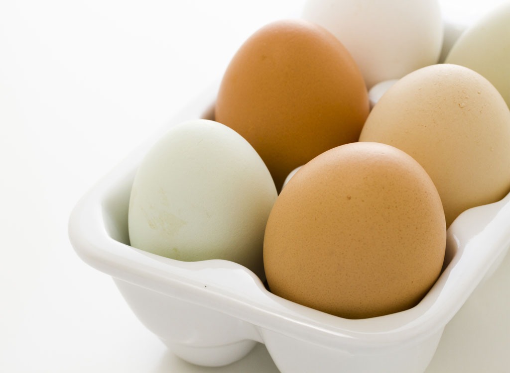 Brown eggs in a carton - foods for energy