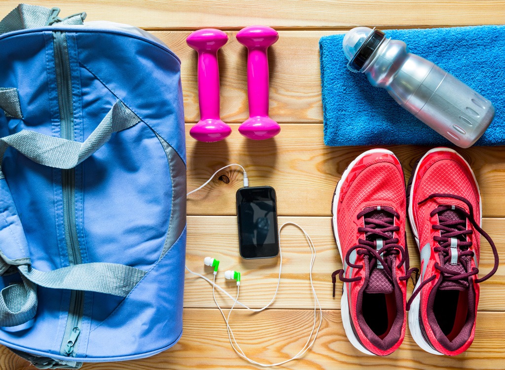 Gym bag weights sneakers shoes water bottle phone music