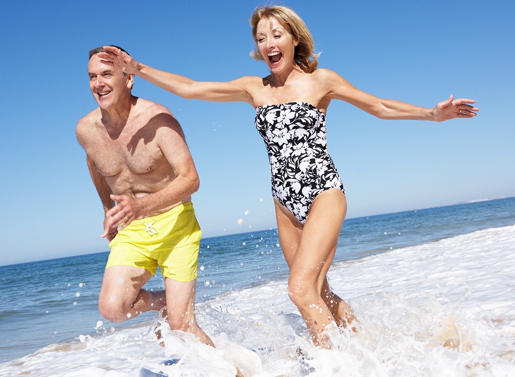 Happy older couple beach