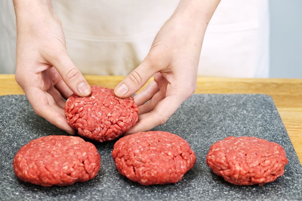 raw hamburger patties