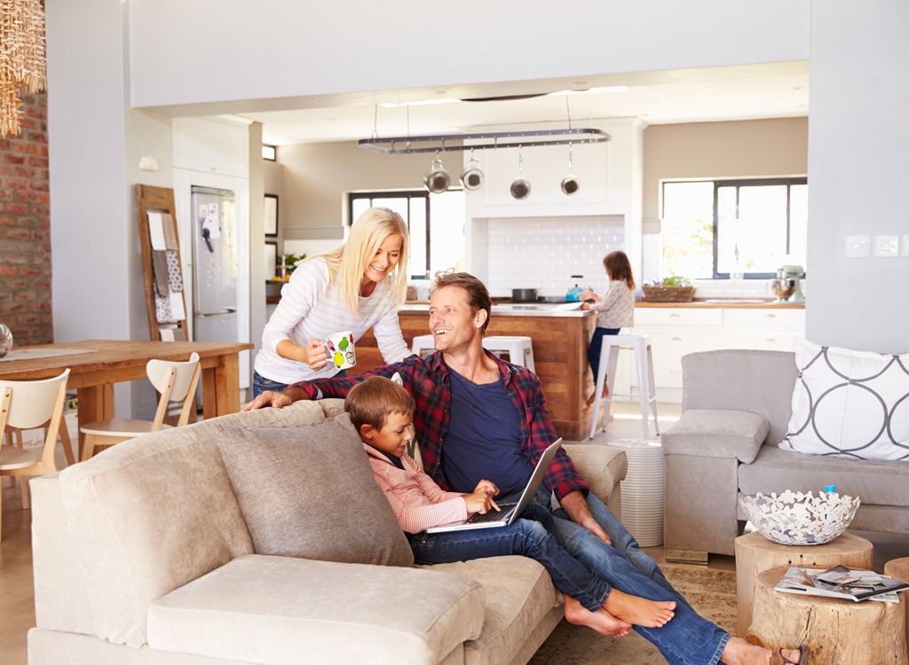 Family hanging out around couch