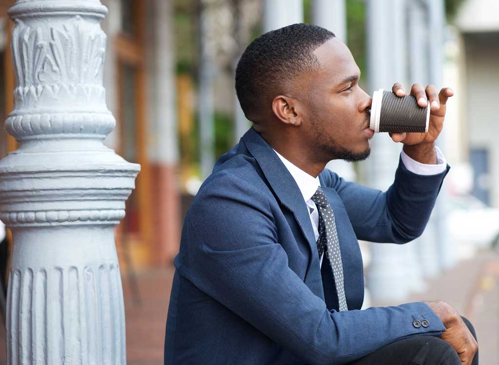Man drinking espresso