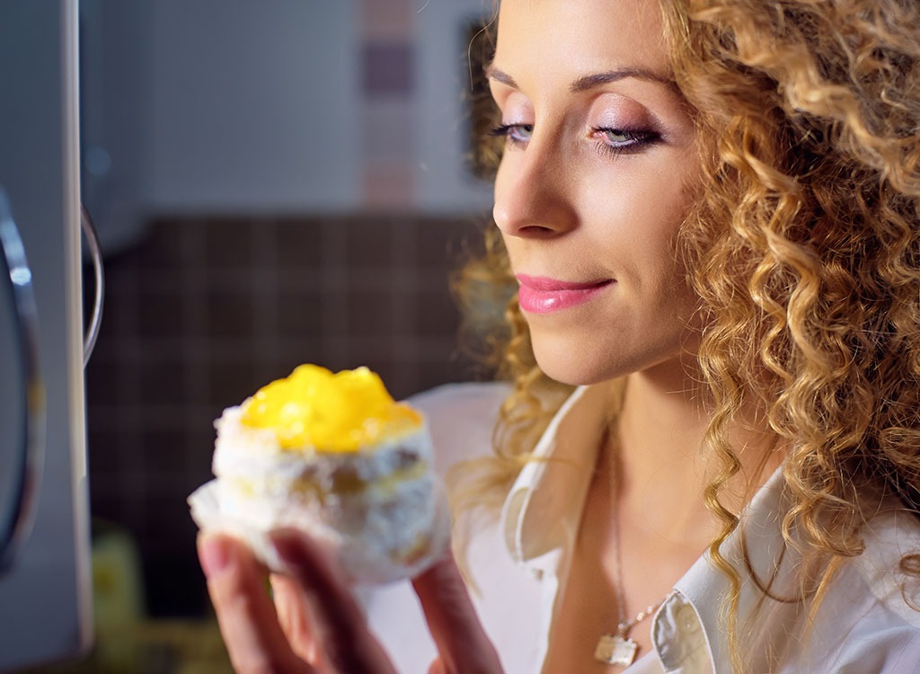 Woman eating - stop thinking about food