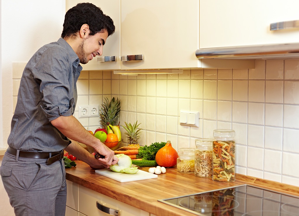 Healthy cook chopping