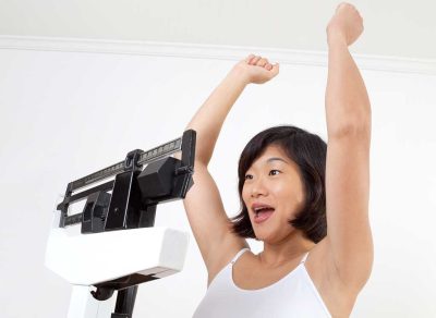 Woman success scale weight loss