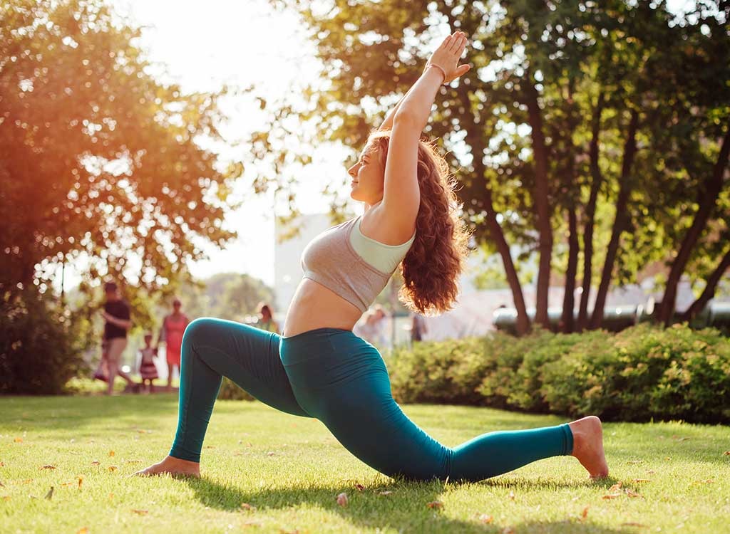 Woman doing outdoor yoga