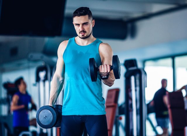 Man doing bicep curls with dumbbells
