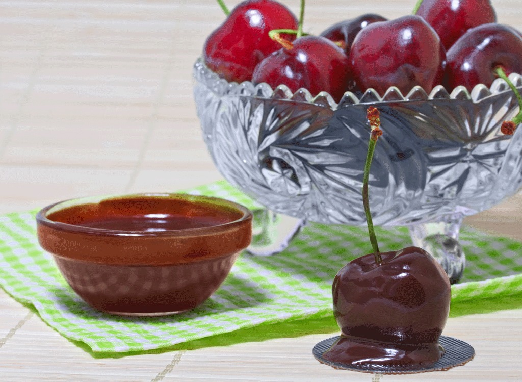 Dipping chocolate-covered cherries