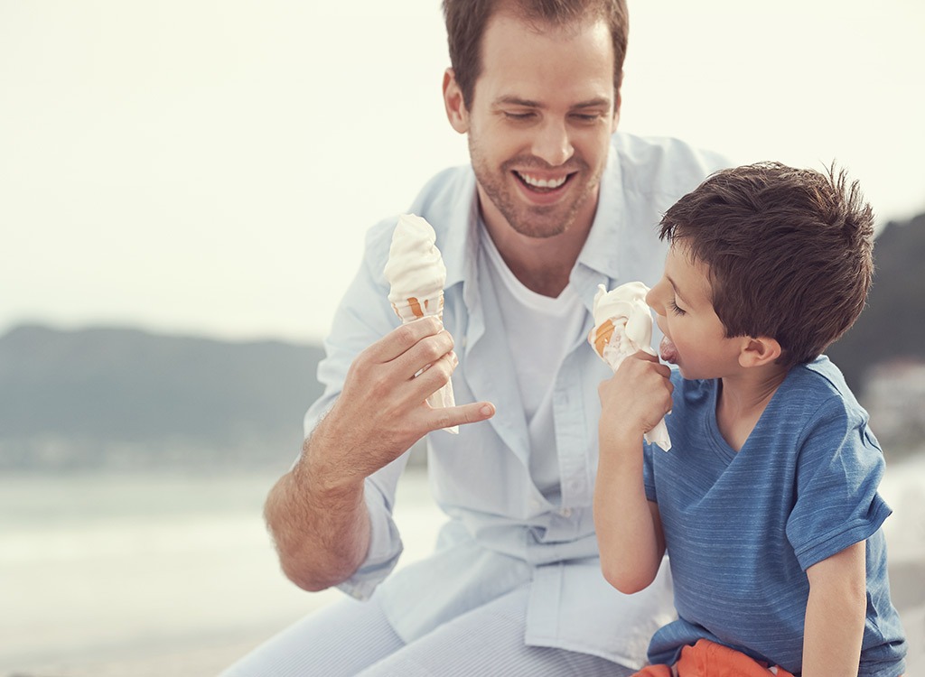 father and son having ice cream