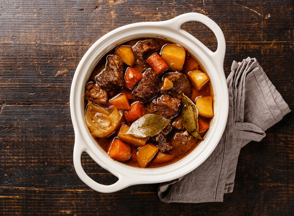 Hearty beef and potato stew with bay leaves ready for dinner