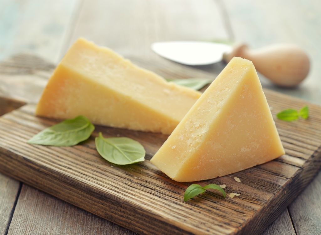 parmesan cheese on wood block