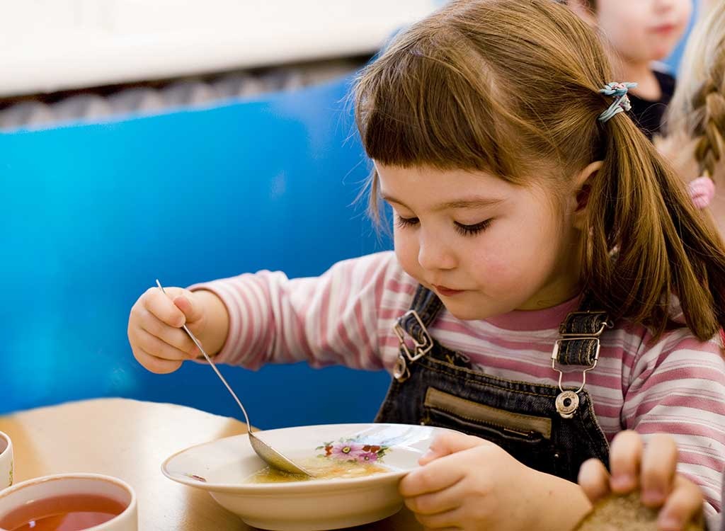 Child eating soup