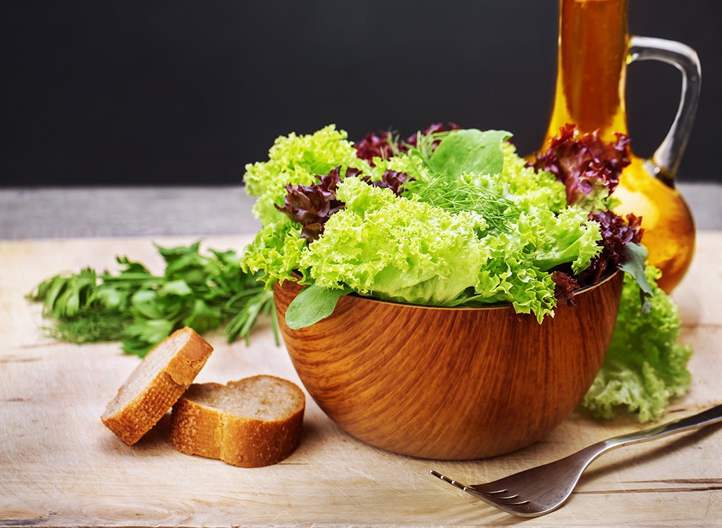 Green salad in wooden bowl