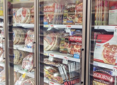 frozen pizza aisle at the grocery store