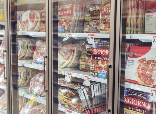 frozen pizza aisle at the grocery store