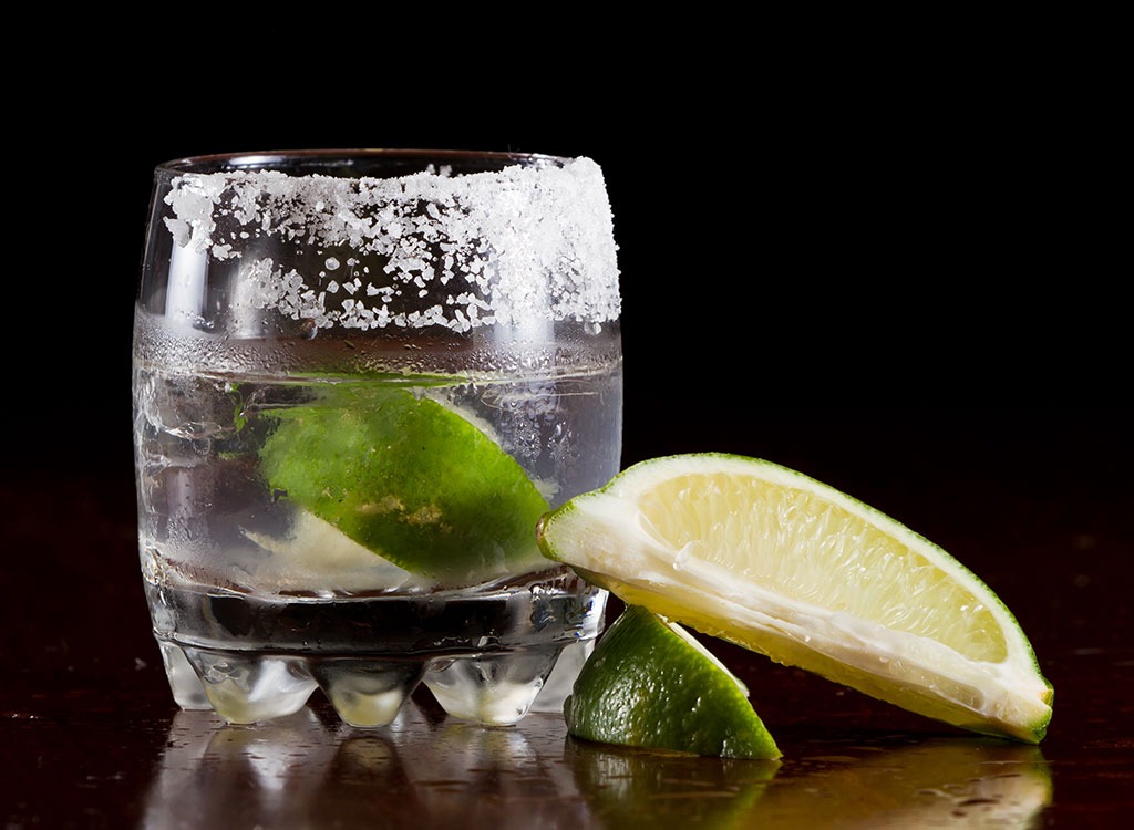 Tequila neat with lime lemon and salt - healthy alcoholic drinks