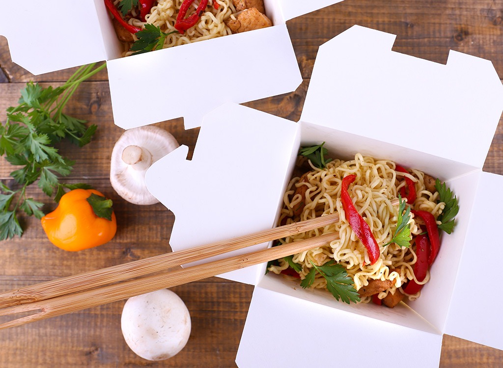 Chinese takeout with chopsticks
