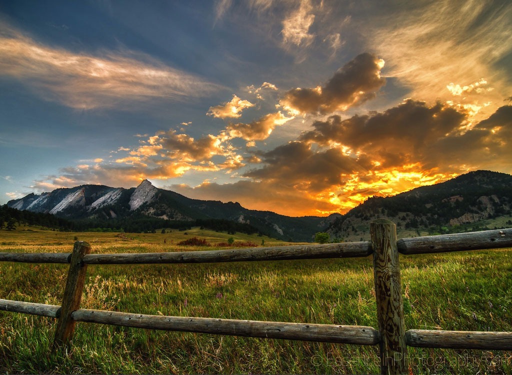 sunset in boulder colorado over farm landscape