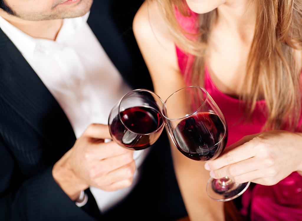 Couple toasting wine glasses