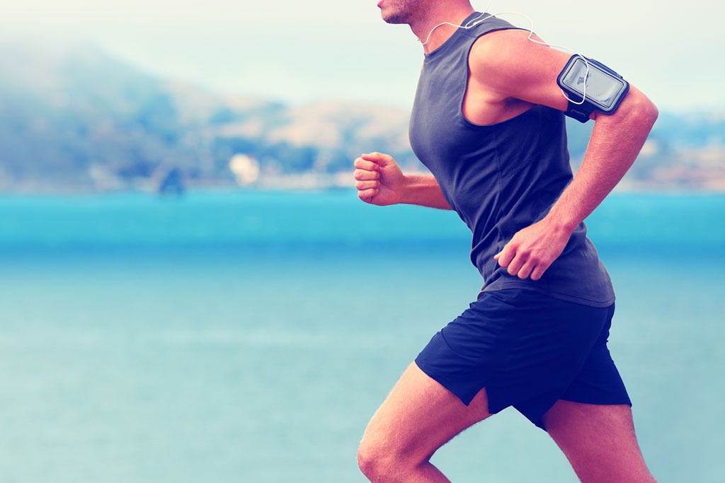 fit man running with music