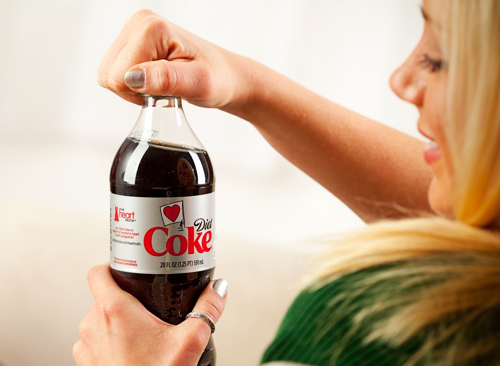 Woman drinking diet coke