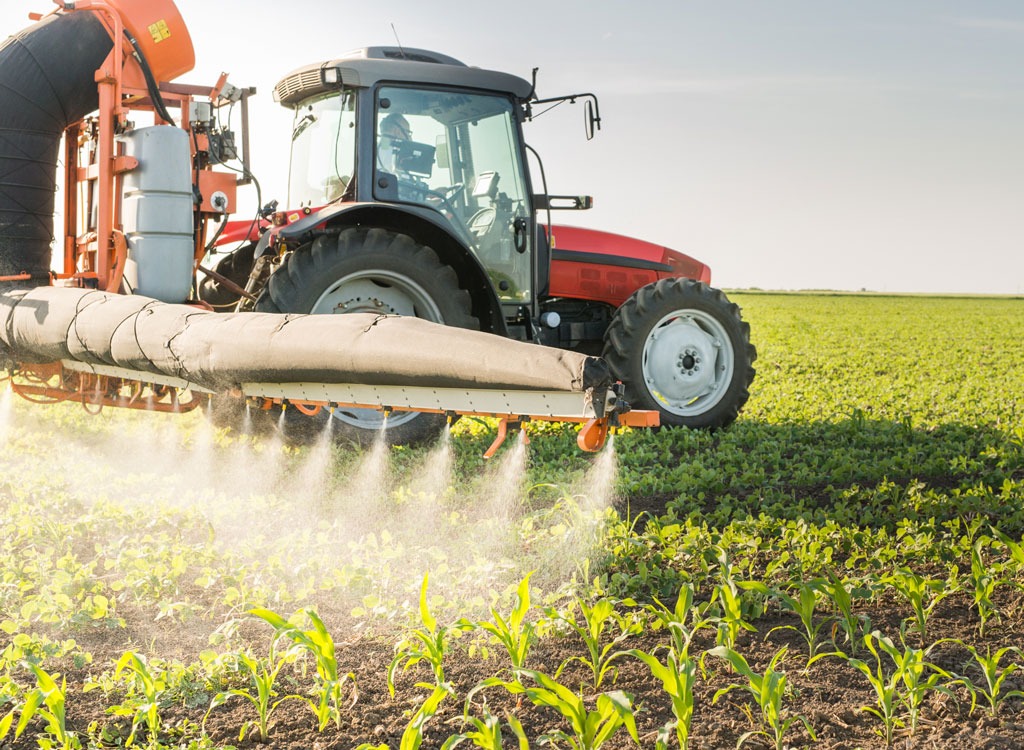 tractor spraying pesticides