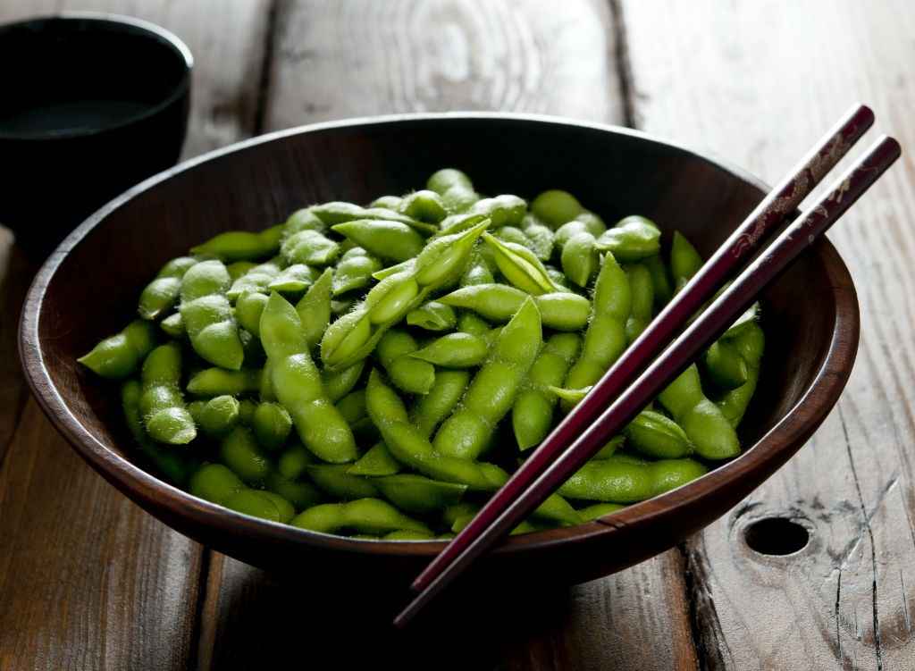 bowl of edamame chopsticks