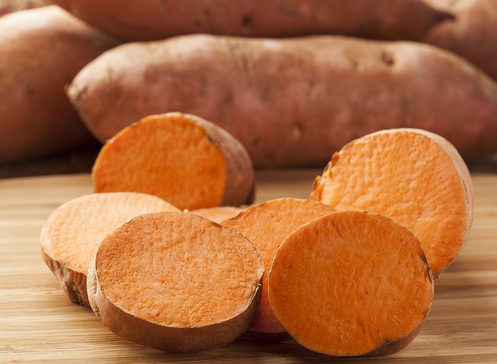 sliced and whole sweet potatoes