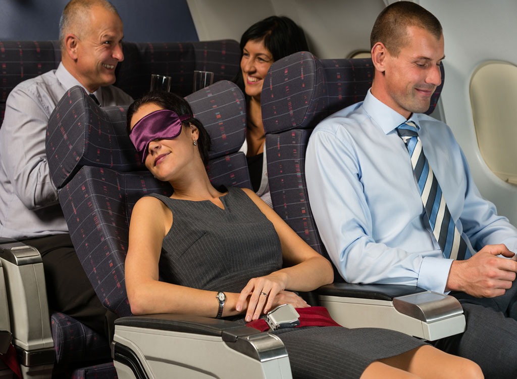 Woman sleeping in the plane