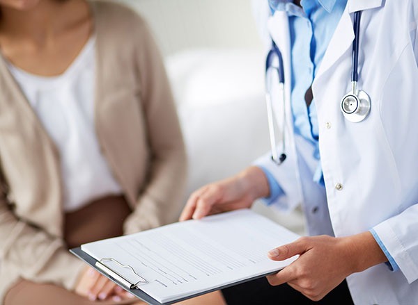 woman visiting doctor