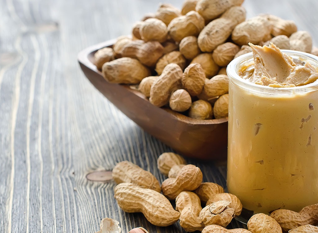 Peanuts in a bowl with peanut butter