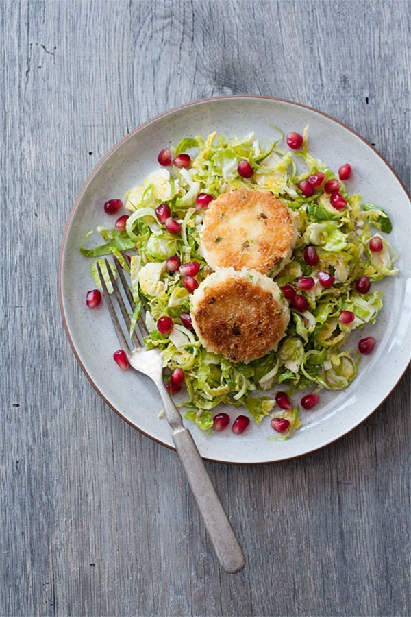 shaved brussels sprout salad with pan-fried goat cheese and pomegranate