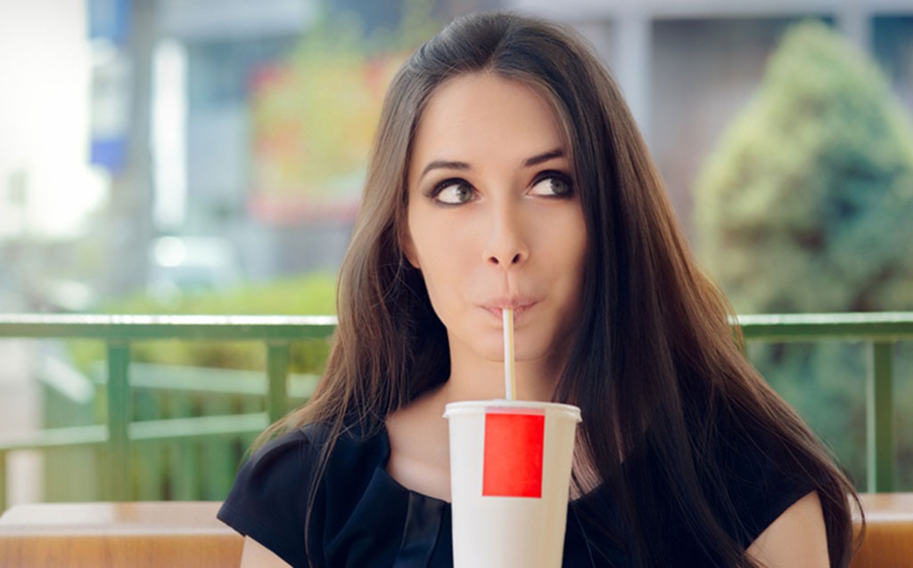 Woman sipping on story