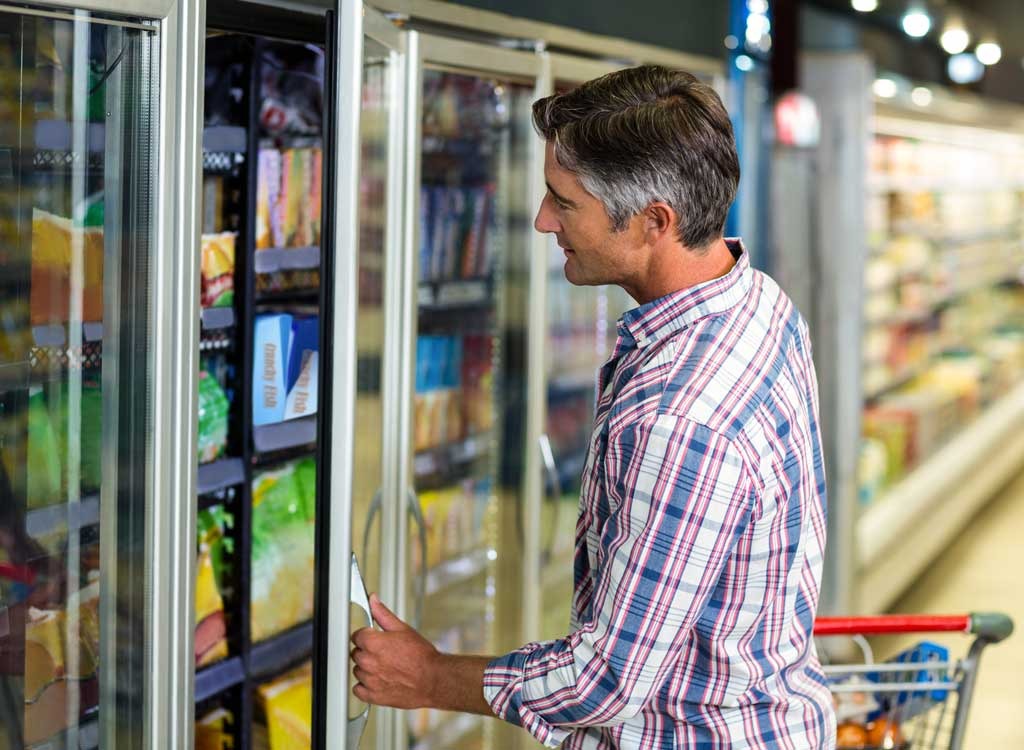 freezer grocery aisle man