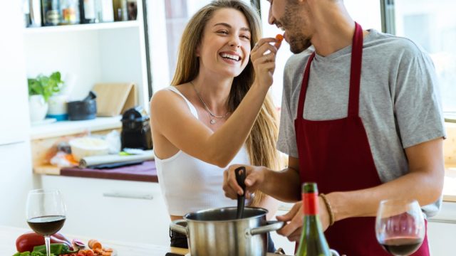 Young couple cooking