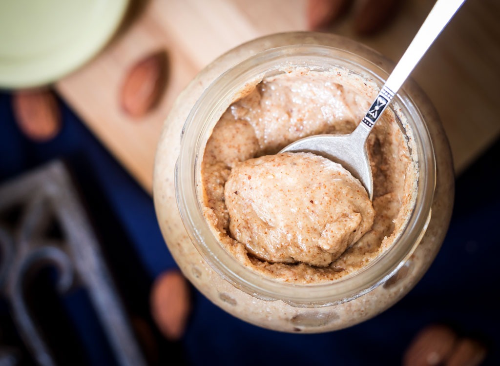 almond butter jar with spoon