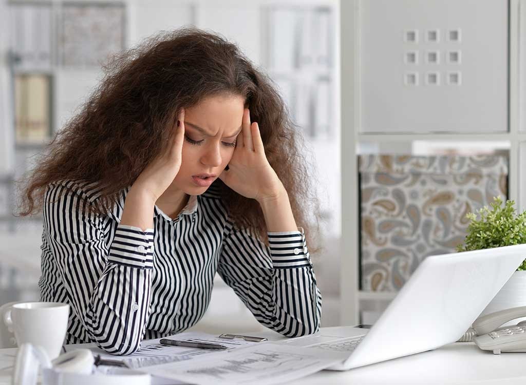 woman with headache stress