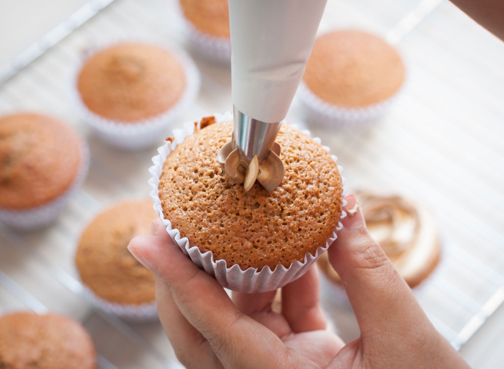 Frosting cupcakes