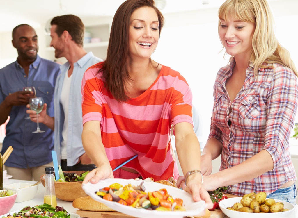 Woman setting party food