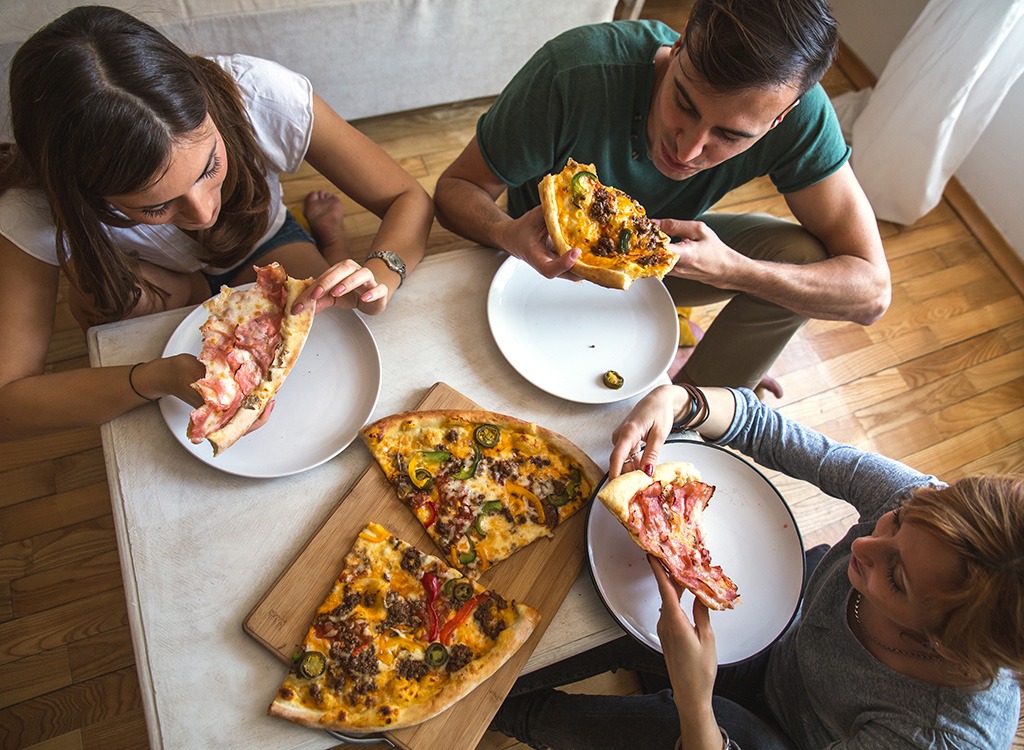 People eating pizza