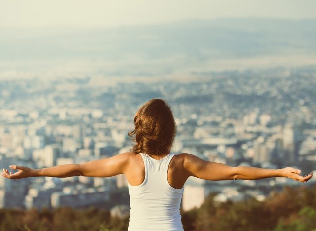 Woman with outstretched arms