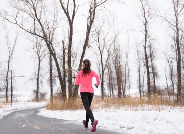 woman running outside in winter