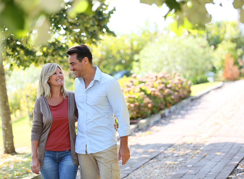 Middle aged couple walking