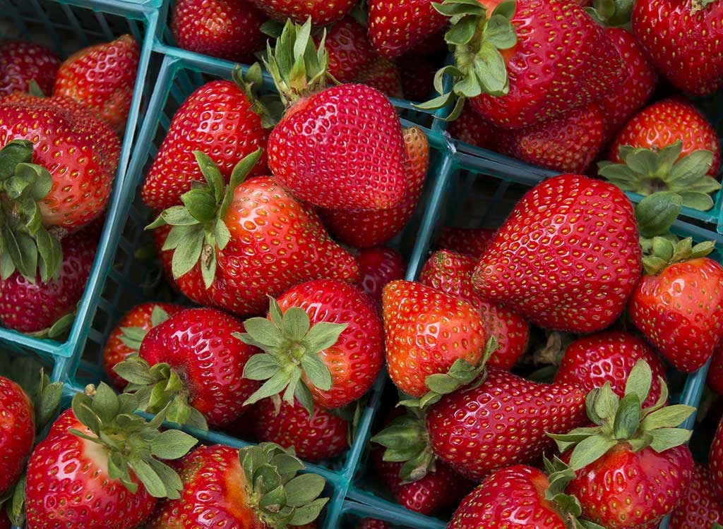 strawberries in bins