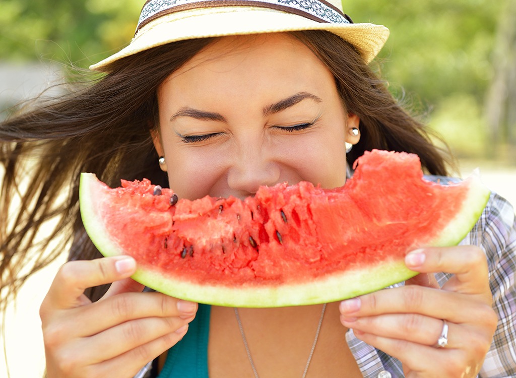 Woman eating watermelon