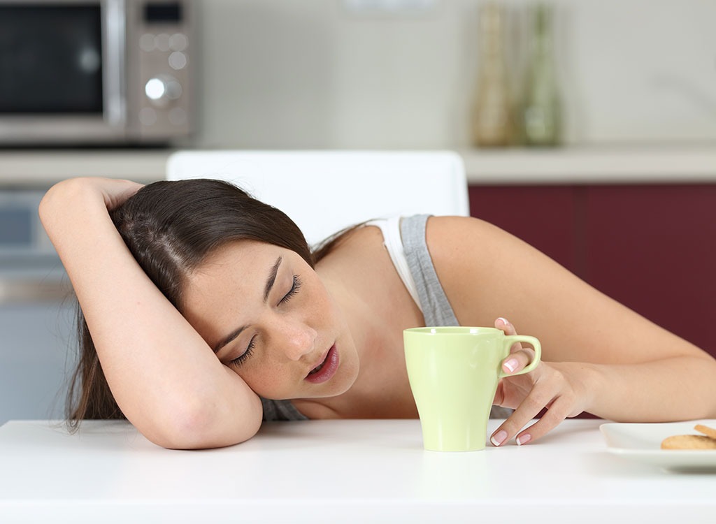 Tired woman with coffee