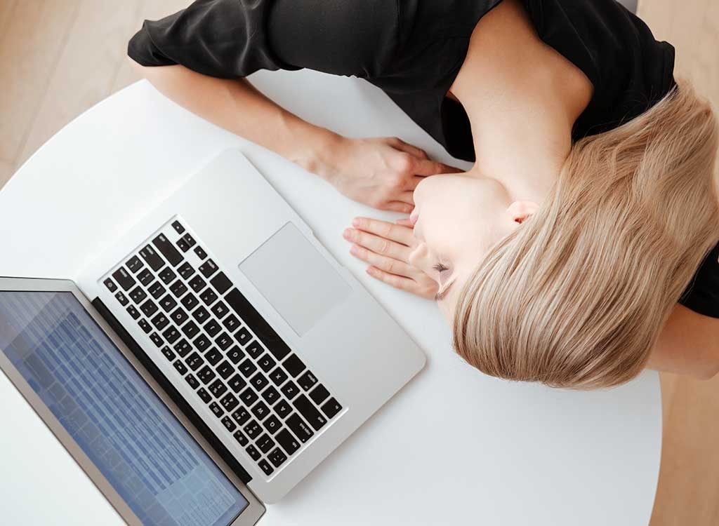 woman tired with laptop