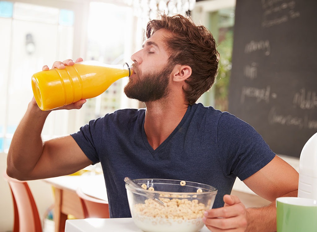 man drinking juice